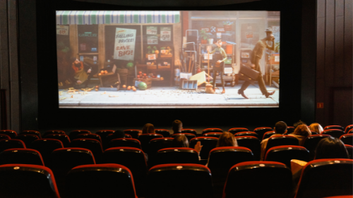 inside image of a cinema with a movie rolling