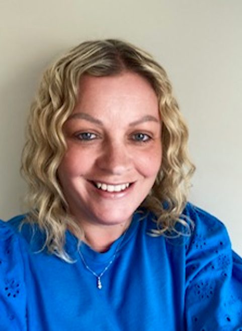 A portrait photo of Rebecca Moore