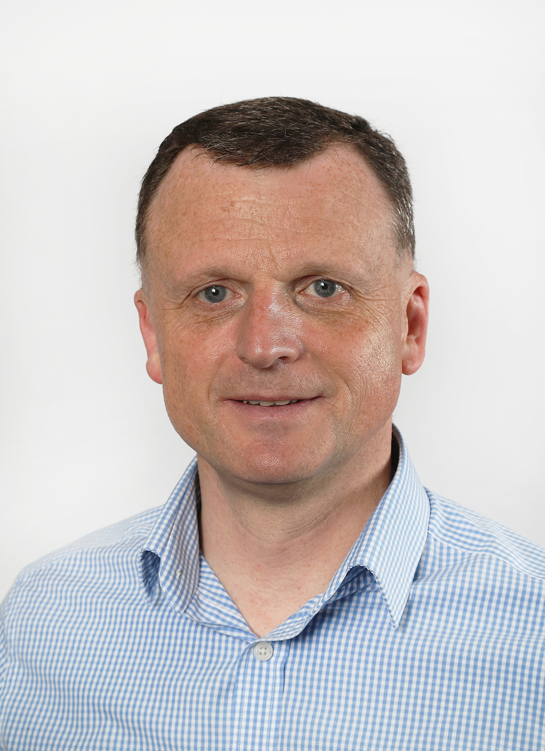 A portrait image of Mark McCreevy