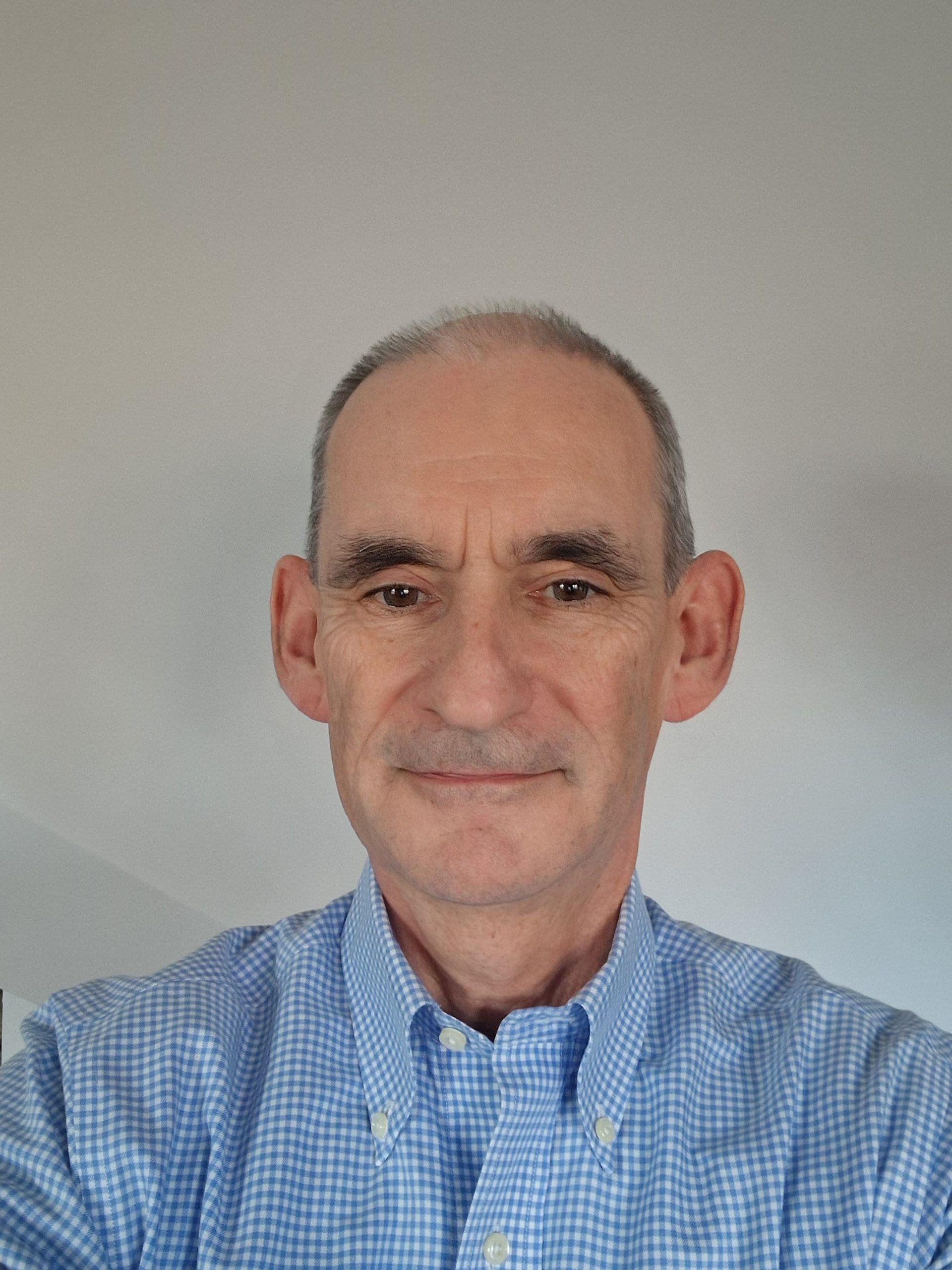 A headshot photo of John Birmingham